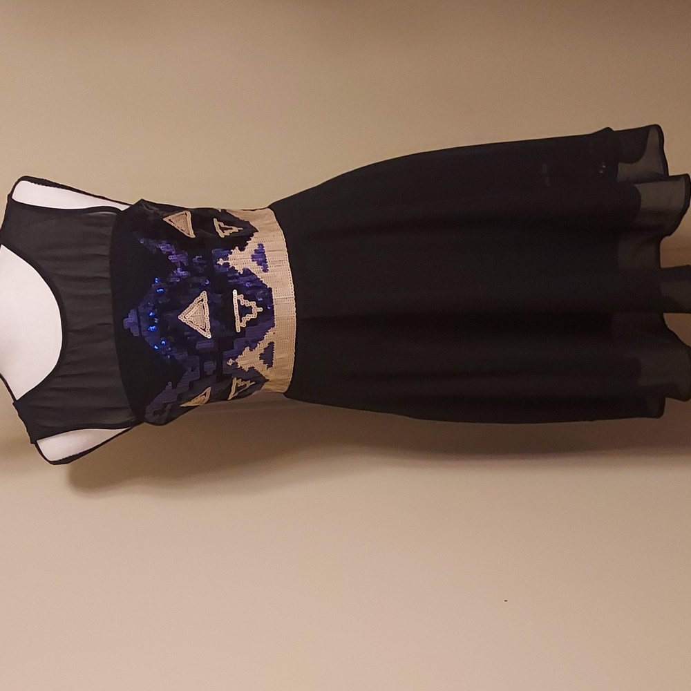 Sequined cocktail dress by Point